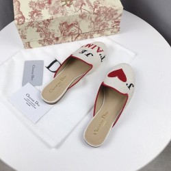 Dioramour Mules (Women’s)